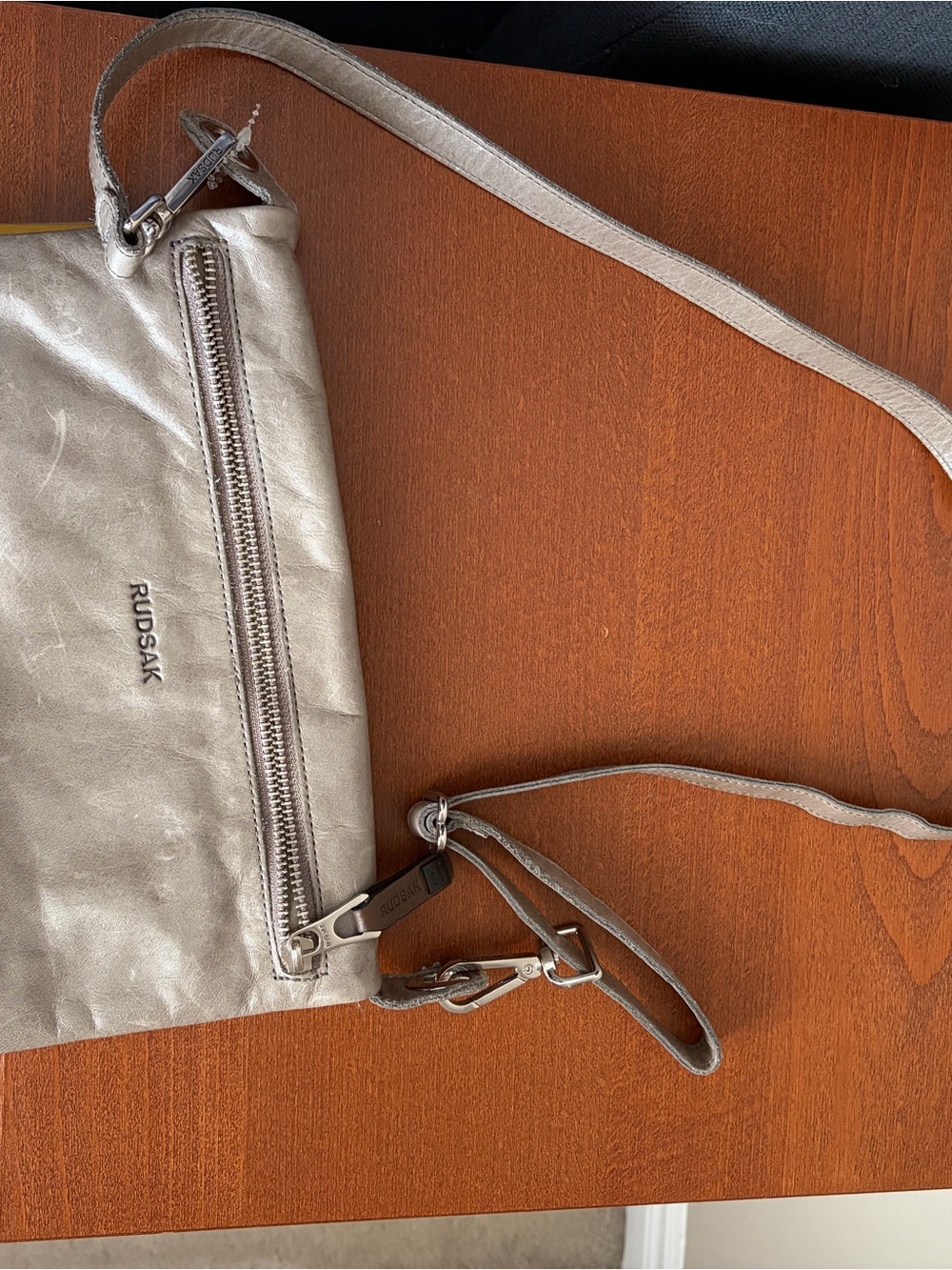 RUDSAK Metallic Silver Crossbody Bag with Zipper Pocket